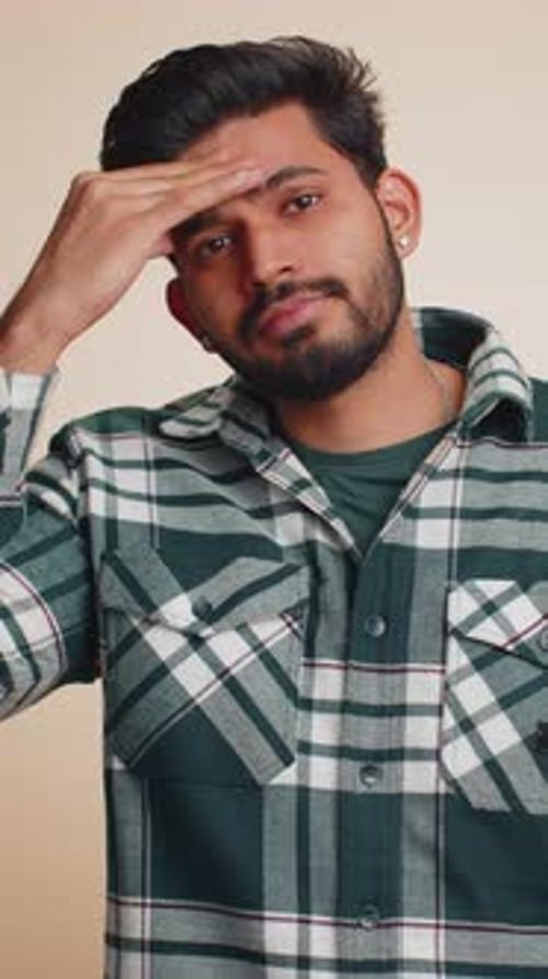 Man Feeling Sick with Headache and Cough