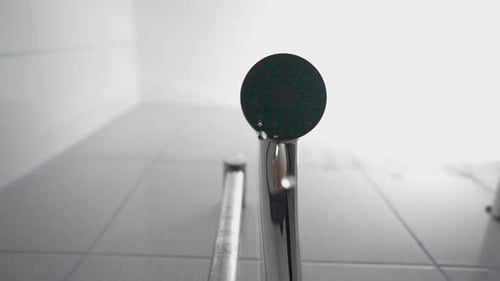 Water Dripping From the Shower in the Bathroom