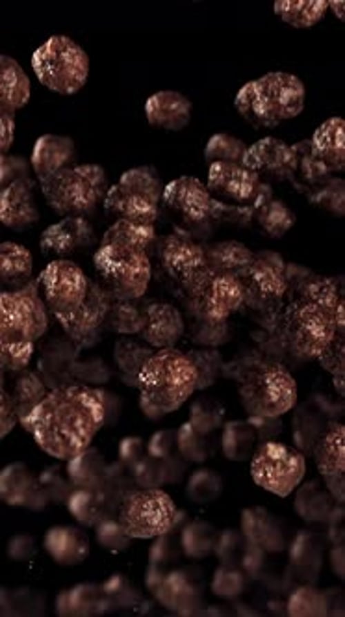 Chocolate Corn Balls Fly Up and Down Filmed on a Highspeed Camera at 1000 Fps