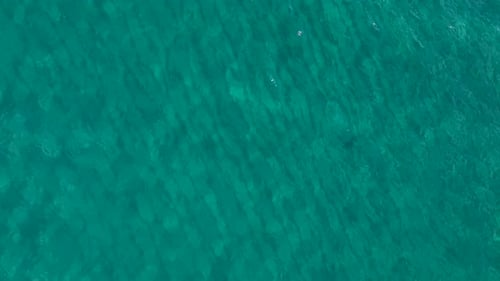 Aerial Video Aerial Perspective of Azure Waters and Rocky Beaches in a Scenic Coastal Location