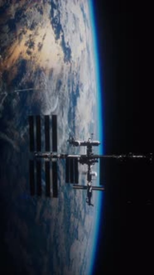 International Space Station on Orbit of Earth Planet View From Space Vertical