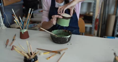 Artist Woman Painting Ceramics Objects Inside the Creative Studio