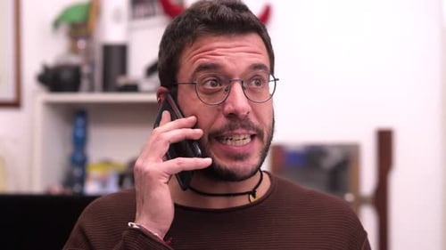 Man Talking on Mobile Phone Close Up