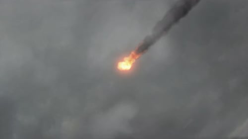 Burning Fiery Meteor Falling Through Dark Clouds