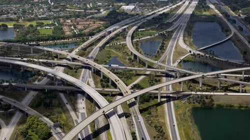 Elevated Freeway Intersection in Miami City with Fast Moving Cars USA Transportation Infrastructure