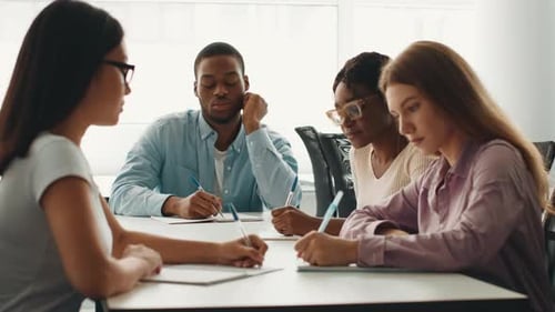 Students Engage in Collaborative Study Session in University Environment