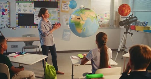 Primary School Children Studying Renewable Energy in Modern Multiethnic Classroom