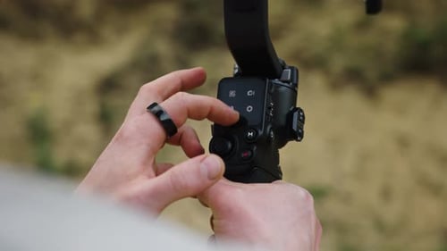 Close Up of Camera Stabilizer Being Operated