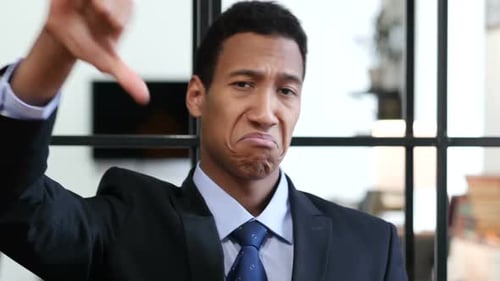Thumbs Down By Black Businessman