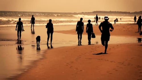 Silhouette Of Man Jogging On Beach, Super Slow Motion 240fps
