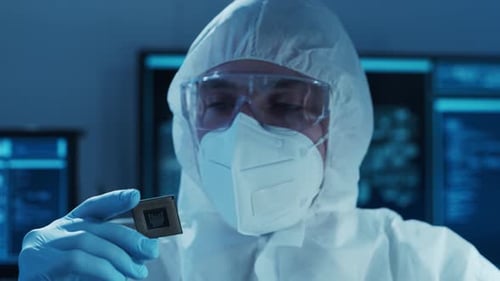 Microelectronics Engineer Works in a Modern Scientific Laboratory on Computing Systems Electronic