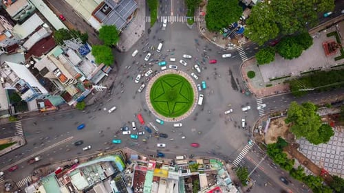 Aerial Topdown Day Timelapse of Busy Roundabout in Ho Chi Minh City Vietnam