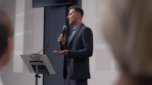 Speech of Male Employee at Business Conference for Office Workers. Speaker Talks