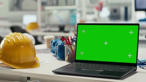Green Screen Laptop Used to Adjust Photovoltaics Factory System Parameters