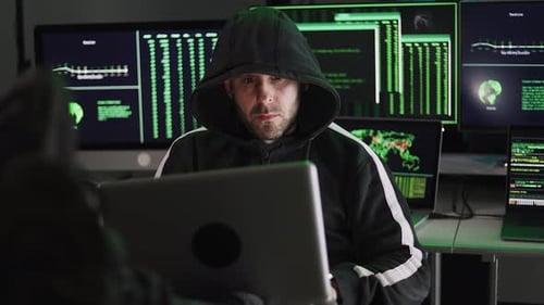Man Hacking at Night in Dark Room