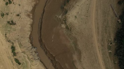 Meandering River Crossing Arid Landscape Aerial View Sequence