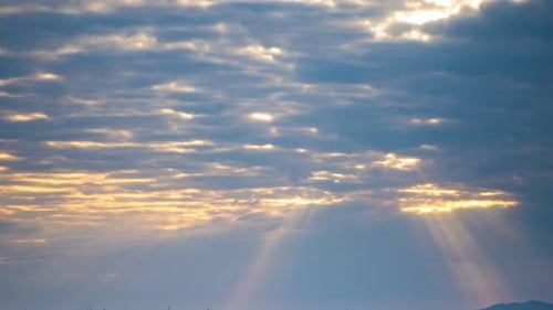Rays of the Sun Shine Through Clouds Over Black Sea