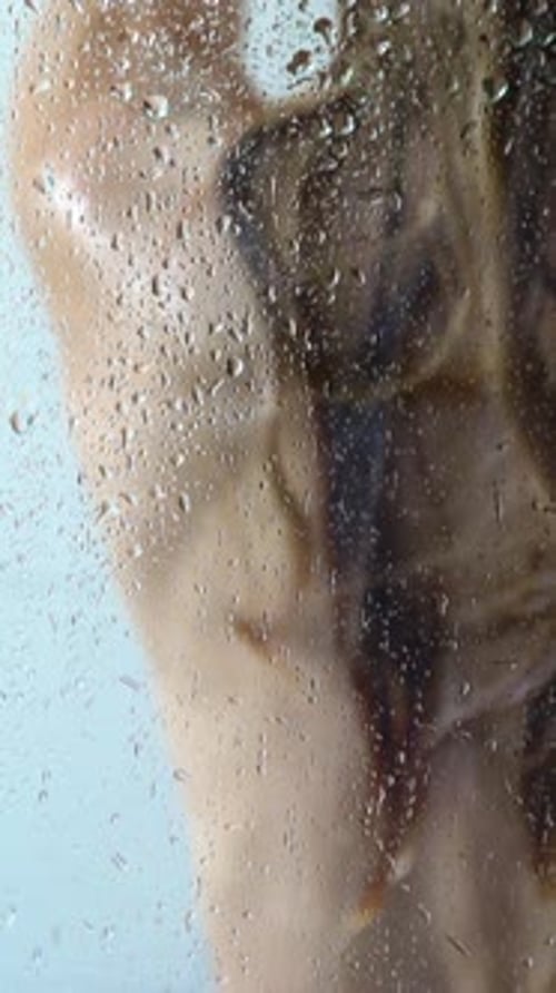Young Slim Woman Taking A Shower And Washing Her Hair