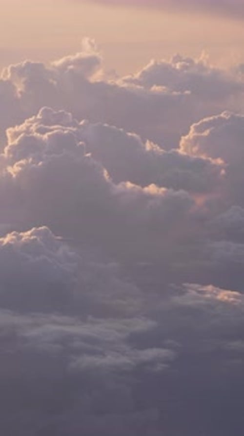 Cloudscape Through Airplane Window Sunset Time Aerial View Vertical