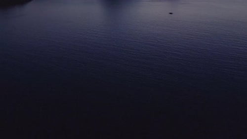 Aerial footage of Padar Island at sunset, known for its rugged hills and beautiful virgin sandy Beac