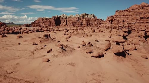 Flying Over Strange Sandstone Rock Shapes in Goblin Valley State Park Utah USA, Dramatic Aerial Pull