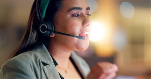 Call center, woman and happy communication at night in office for customer service