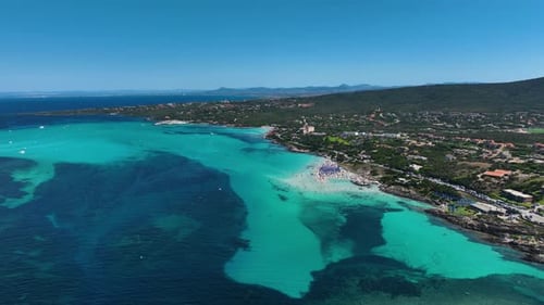 Aerial view on beach, people and umbrellas. Vacation and adventure. Mediterranean Sea.