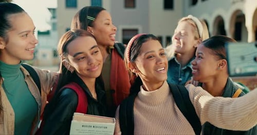 Laughing, students and selfie on diversity school, college and university campus for social media