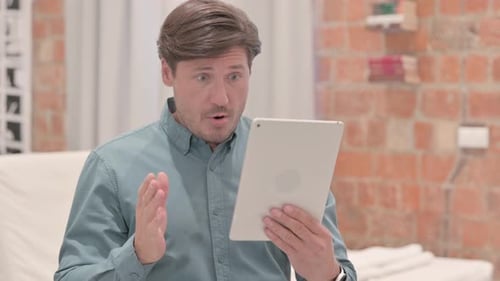Man Reacts Negatively to Tablet Content