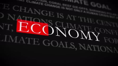 High-resolution close-up of economic headlines with the word 'ECONOMY' in bold red