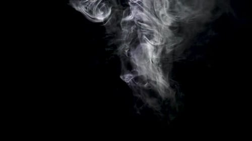 White Smoke Rising on Black Background