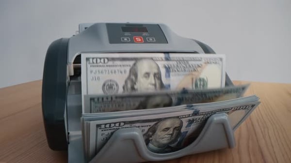 Money Counter Counts Stacks of Hundred Dollar Bills, Stock Video — Envato