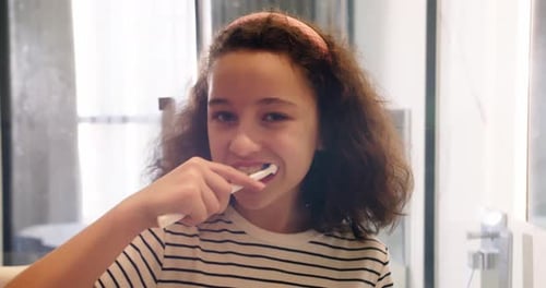 Child Daily Healthcare Routine Cute Caucasian Child with White Tooth Looking at Mirror Isolated at