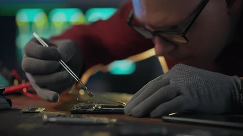 Repairing Cell Phone Electronics on a Workbench