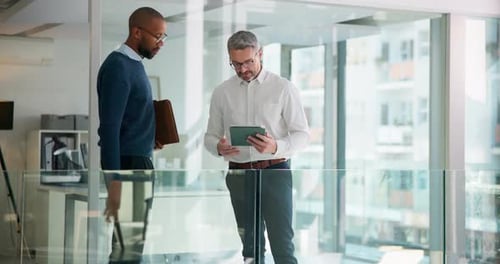 Business men, tablet and shaking hands in office with finance report, budget review and statement