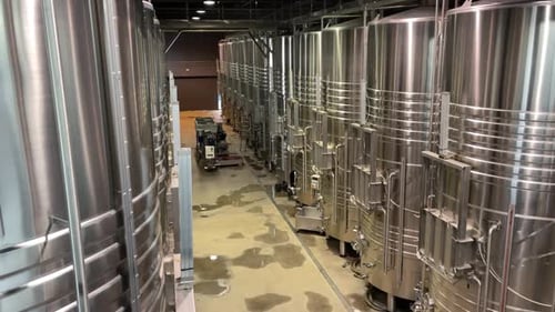 wine cellars in somontano and rioja in spain barrels and elaboration process, tasting metal hoopers