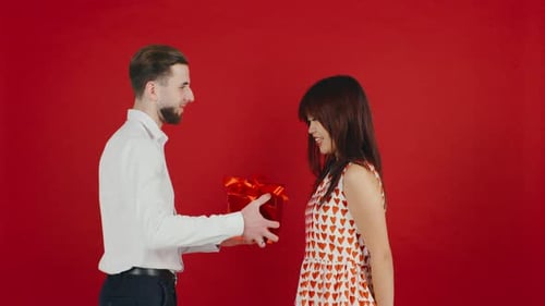 Loving Couple Giving Anniversary Gift