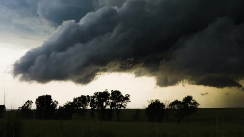Dark Storm Clouds Rolling Over Rural Landscape