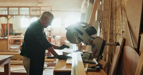 Mature man, circular saw and woodcutter for construction, building or project for material