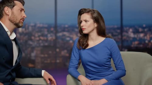 Two Tv Show People Discussing Global World Problems in Air Studio Close Up