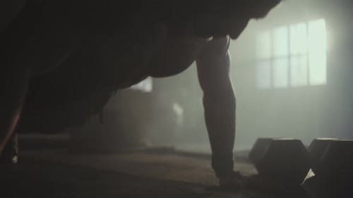 Fitness man doing push ups