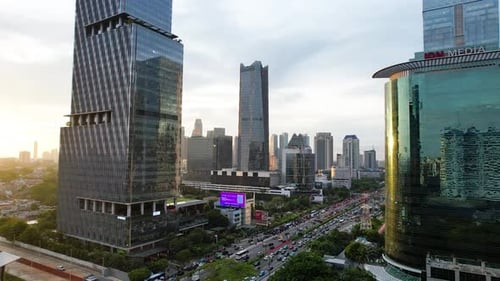 Panoramic cityscape of Indonesia capital city Jakarta at sunset.