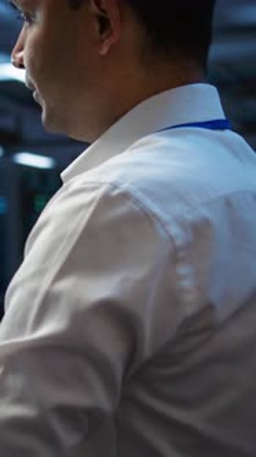 Vertical Video Computer Scientist Overseeing Data Center Making Improvements