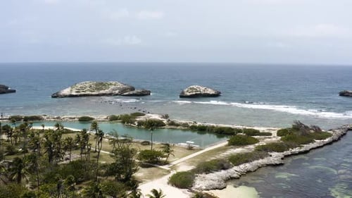AERIAL - Beautiful beach of Cayo Lobos, Fajardo, Puerto Rico, wide forward shot