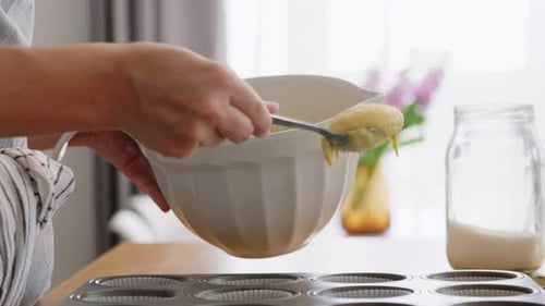 Culinary, Bake and People Concept - Happy Smiling Young Woman Cooking Food
