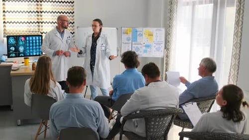 Medical Professionals Training in Sunny Clinic Room