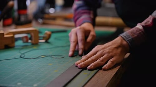Crafting Leather Goods By Hand on a Cutting Mat