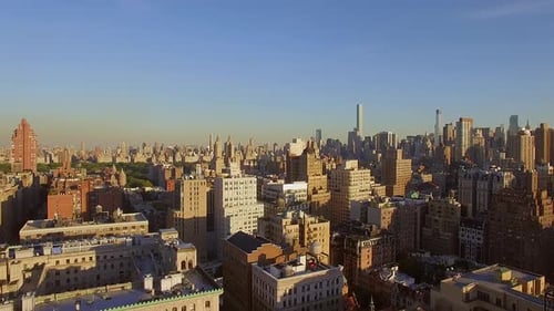 Enjoy a Breathtaking Panoramic View of the Manhattan Skyline on a Clear and Sunny Day
