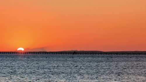 Bright and vibrant sunrise over Red Sea, handheld view