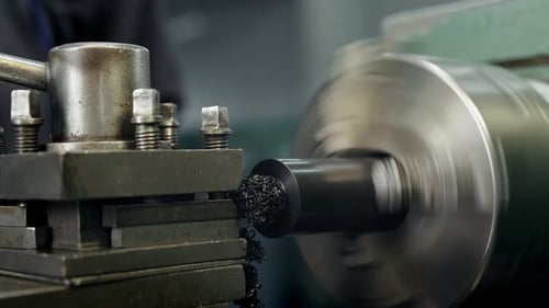 Machine Shaping Metal Rod Close Up